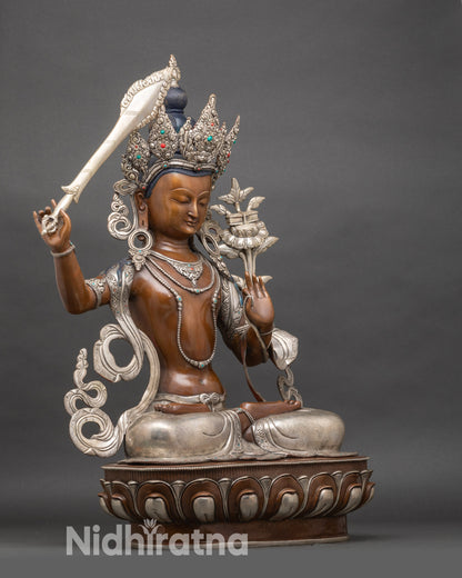 Side view Manjushree Bodhisattva statue with Prajnaparamita Sutra and engraved lotus pedestal