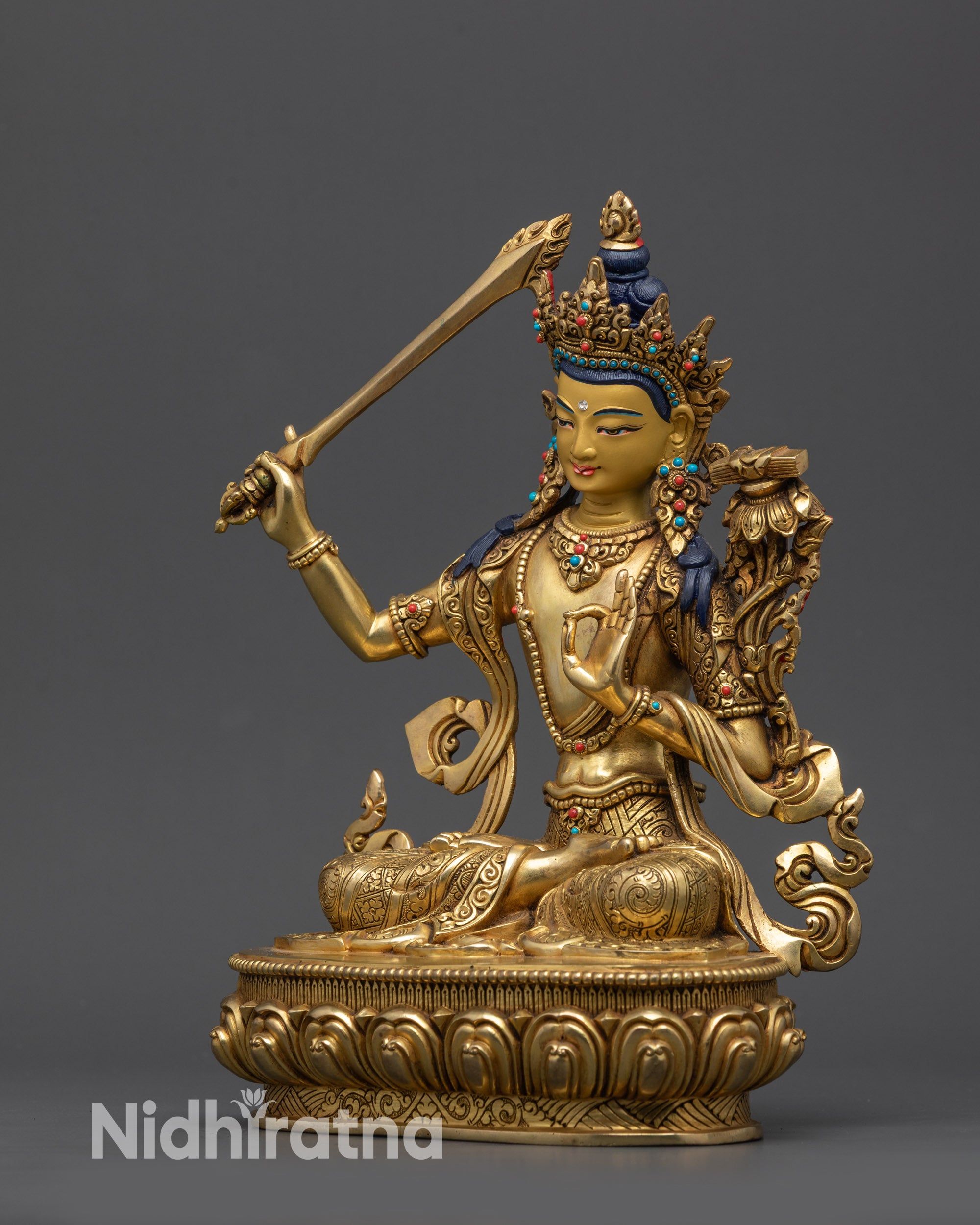 Side view Manjushree holding utpala flower and double-edged sword with wisdom flame