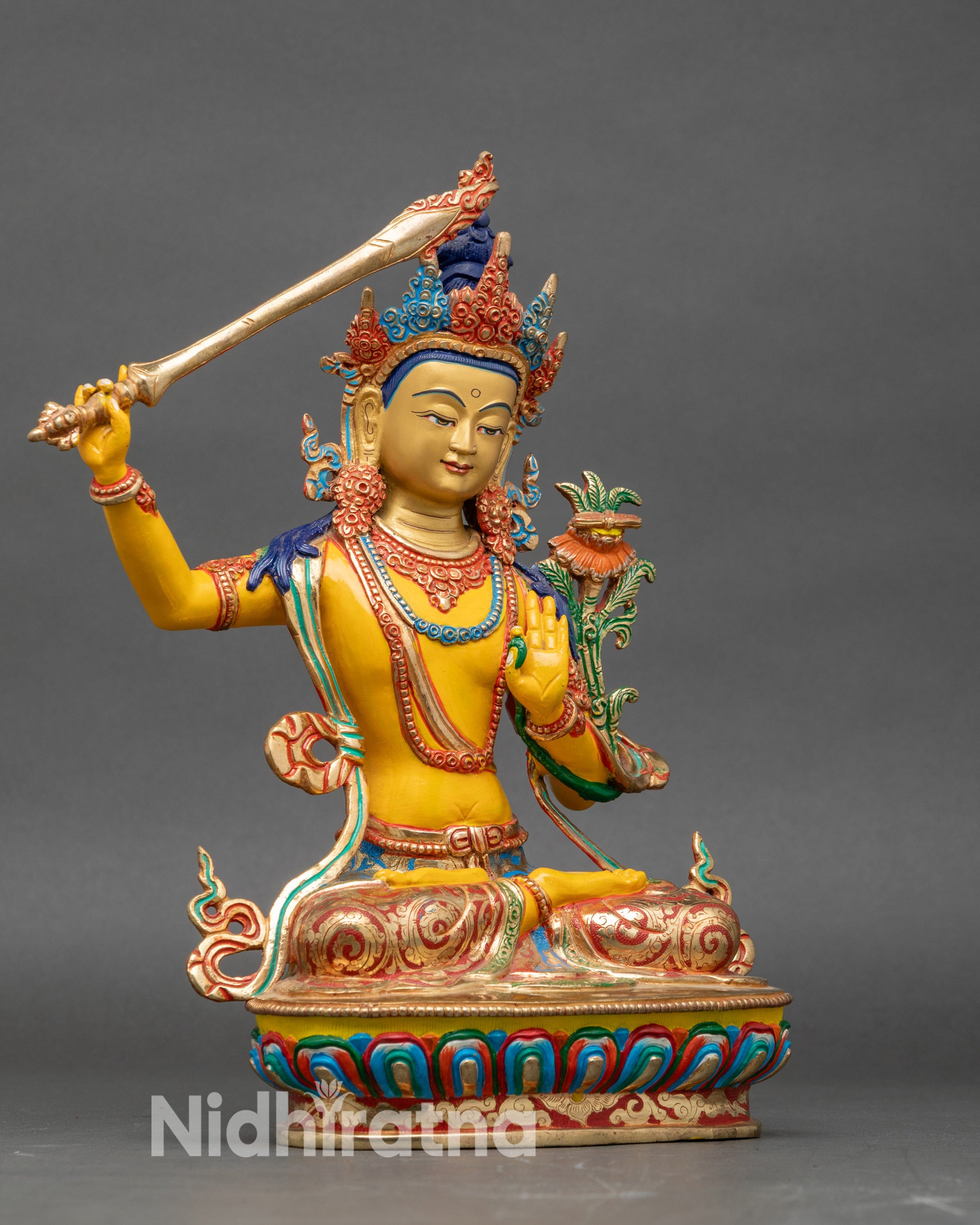 Side view Manjushree holding wisdom sword and utpala flower with Prajnaparamita Sutra
