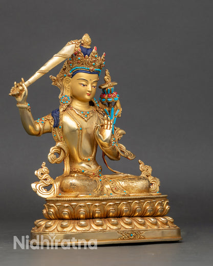 Side view Manjushree sculpture holding wisdom sword and lotus with Prajnaparamita Sutra