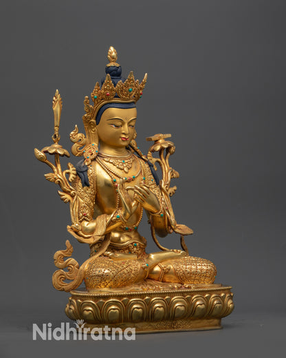 Side view Manjushri Bodhisattva Statue showing detailed robe, jewelry and utpala flower