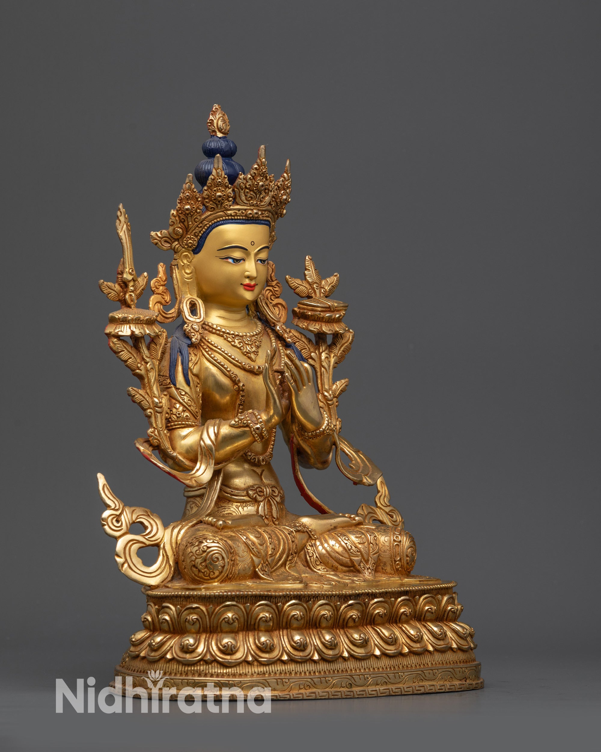 Side view Manjushri Statue holding utpala flower with Dharmachakra Mudra