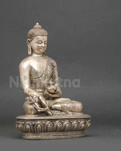 Side view Medicine Buddha statue, silver-plated Newari handcrafted meditation figure