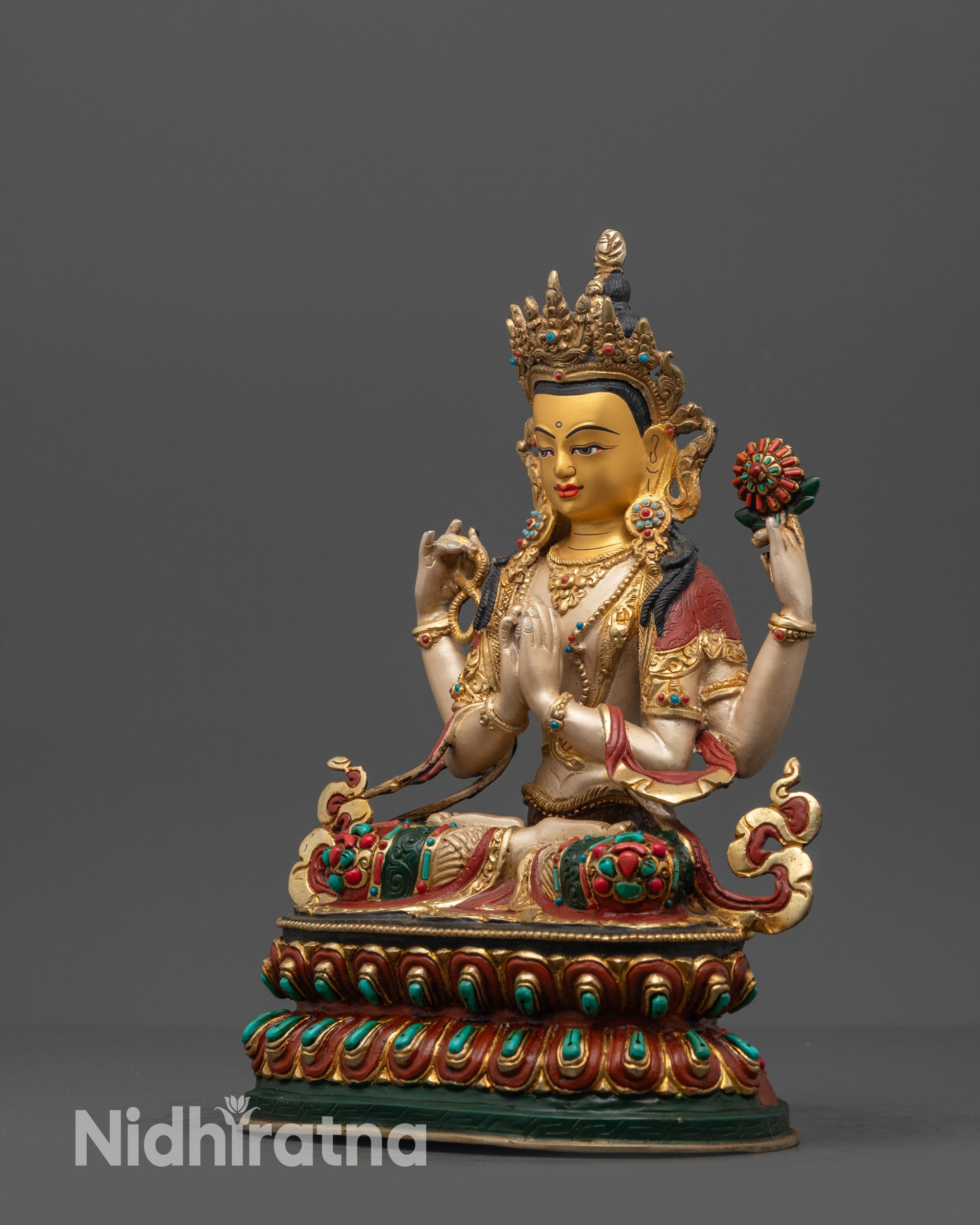 Side view Nepalese Chenrezig avalokiteshvara holding crystal rosary lotus and wish-fulfilling gem
