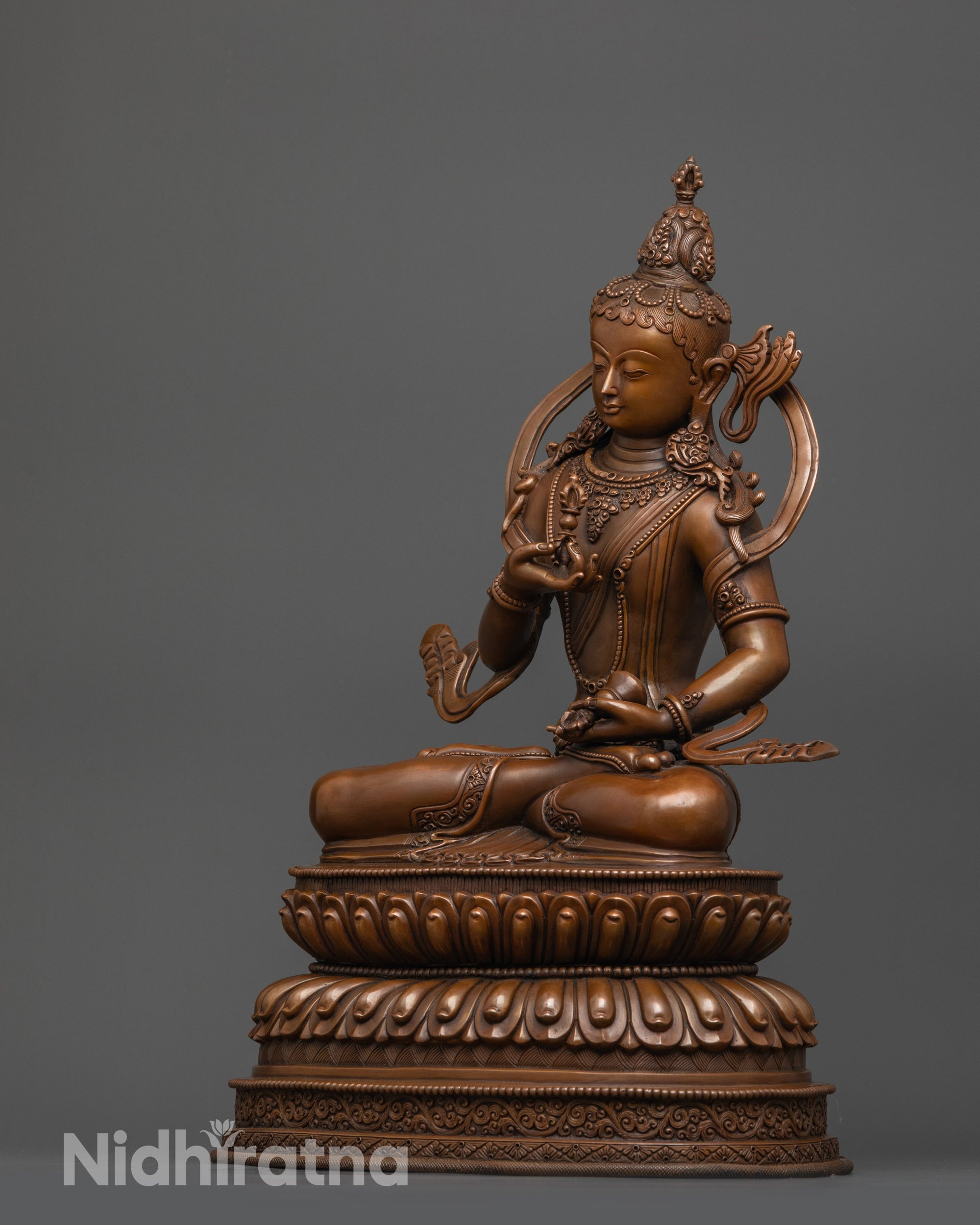 Side view Oxidized Dorje Sempa Statue seated on double-layered lotus base