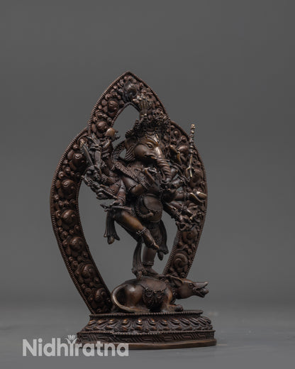 Side view Oxidized Ganesha Statue highlighting flowing robes and detailed halo carvings