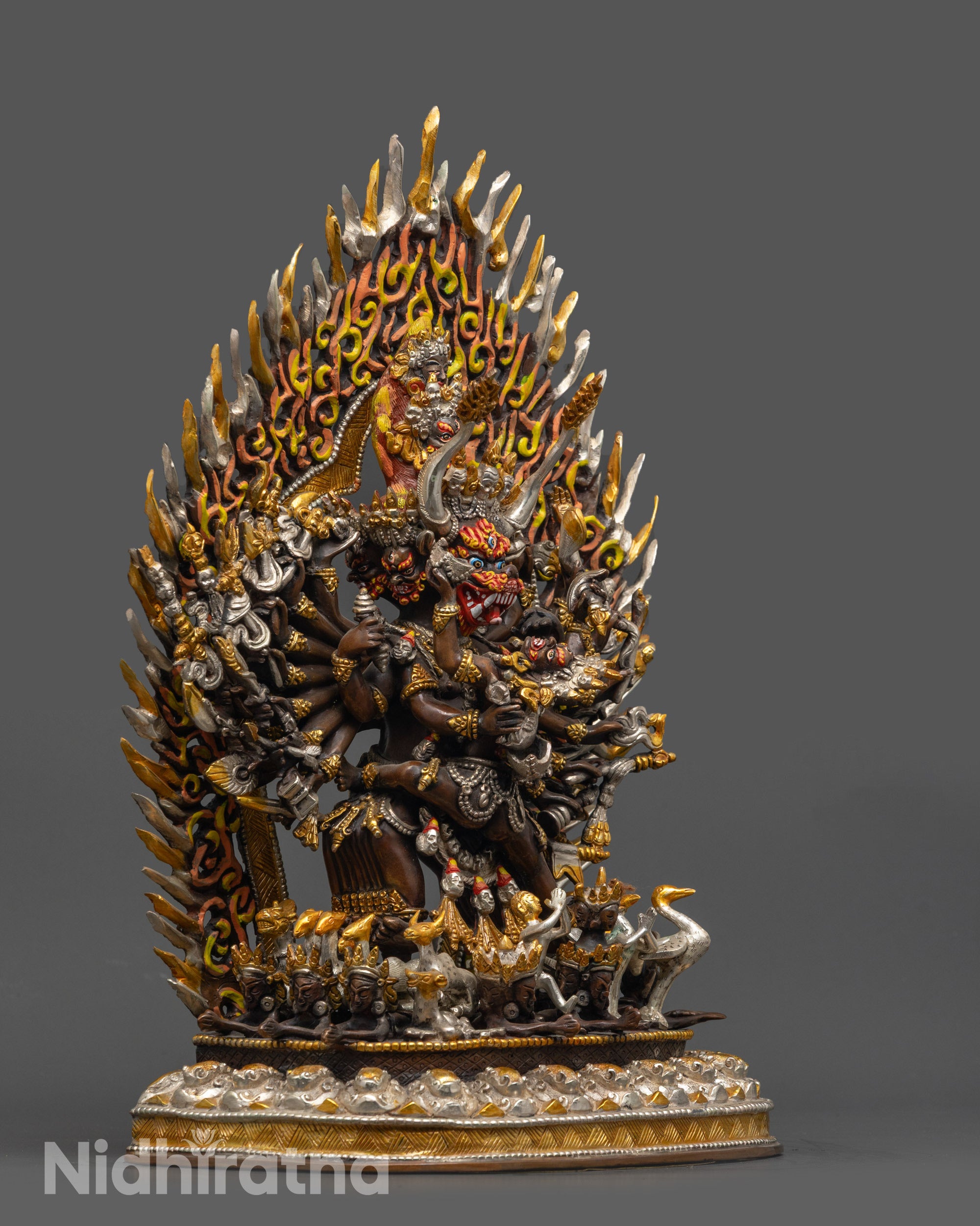 Side view Oxidized Yamantaka Statue showing intricate carvings and blazing halo