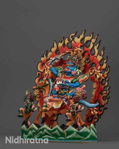 Side view Palden Lhamo statue seated on mule with staff and vibrant skullcup
