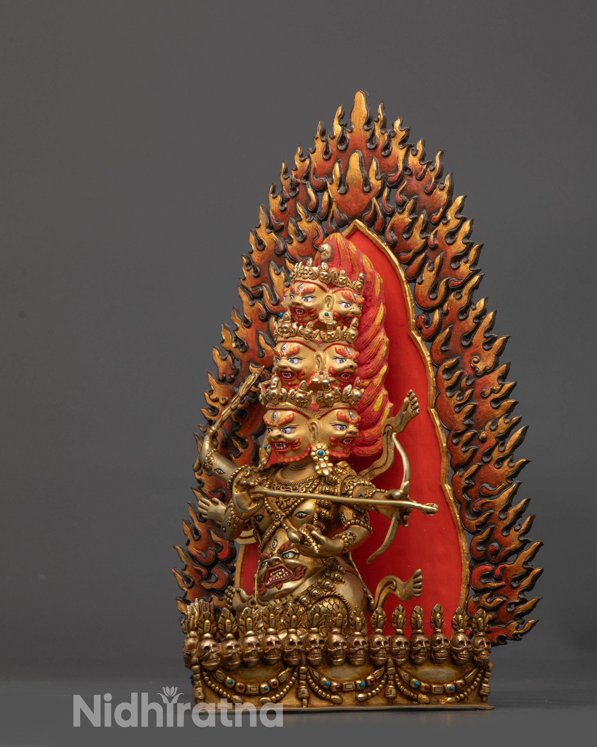 Side view Rahula naga body with bow and arrow detail
