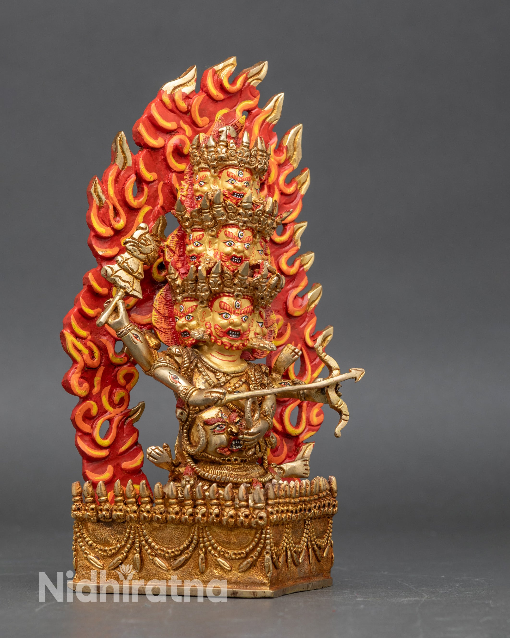 Side view Rahula naga body nine wrathful heads Himalayan tantric protector statue