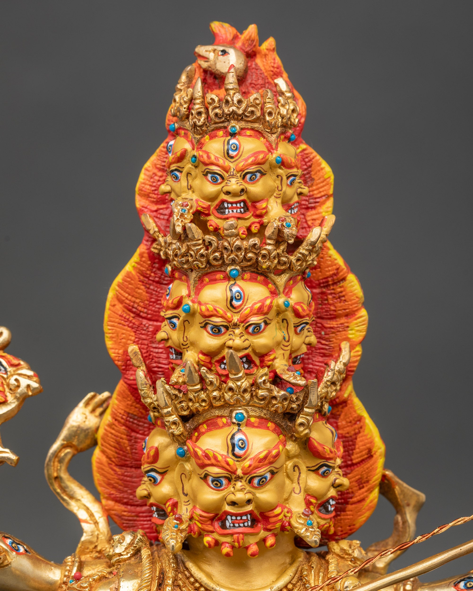 Side view Rahula statue naga body nine wrathful heads copper gold tantric protector