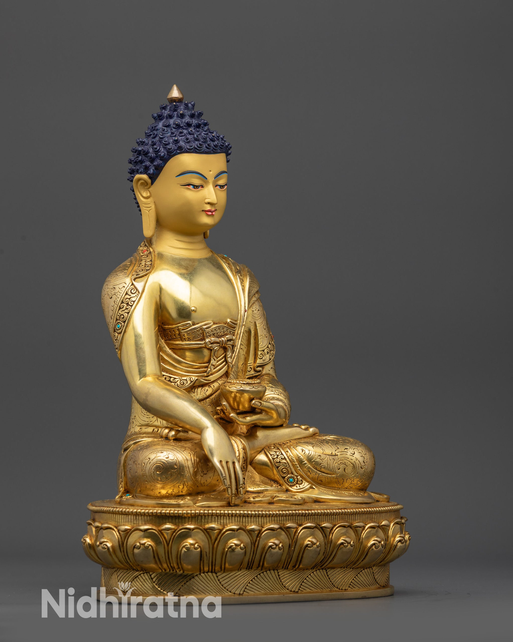 Side view Samana Gotama Statue lotus pose Buddha holding patra bowl