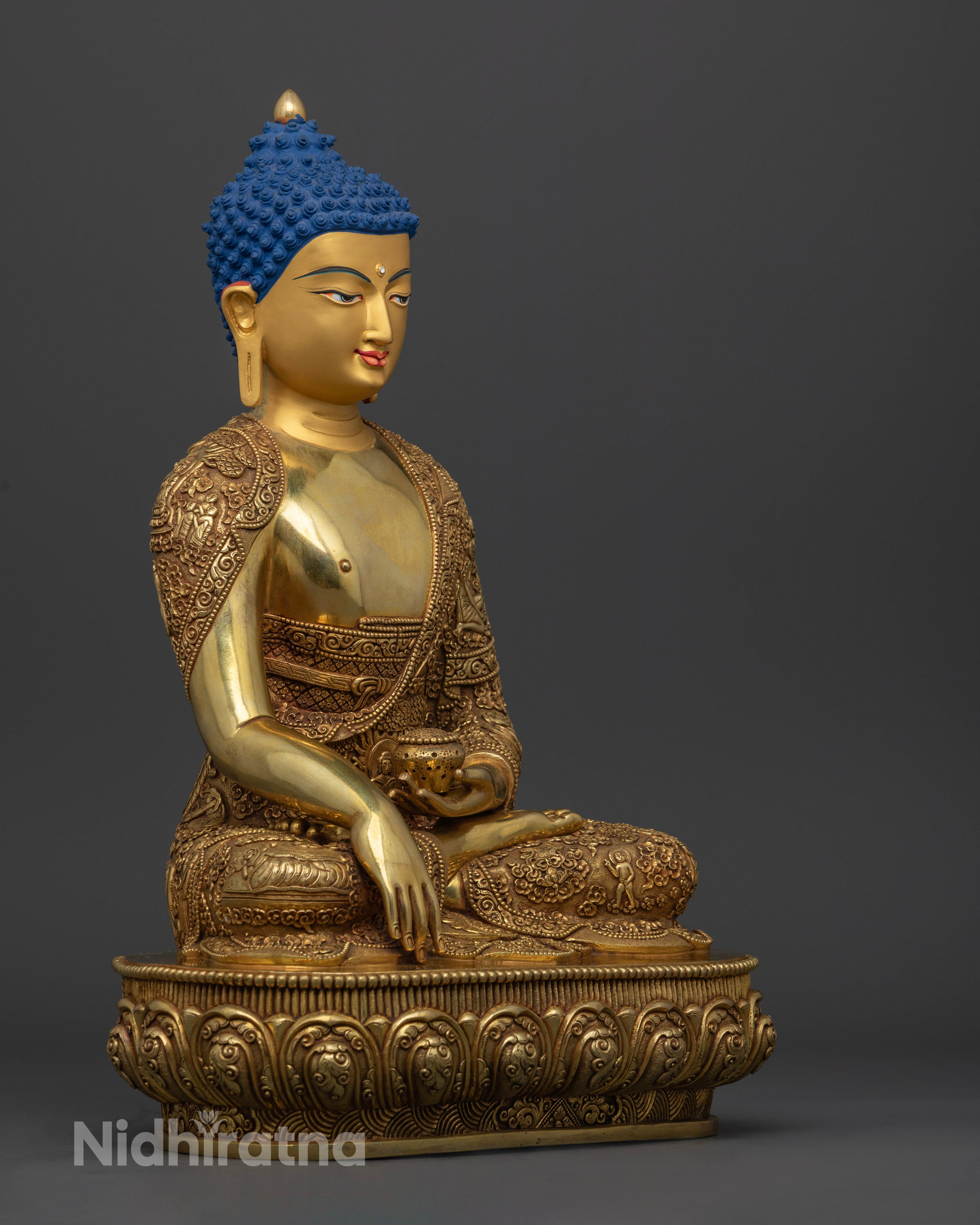 Side view Shakyamuni Buddha statue gold gilded copper robes detailed Newari craftsmanship