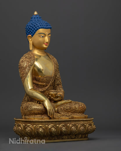Side view Shakyamuni Buddha statue gold gilded copper robes detailed Newari craftsmanship