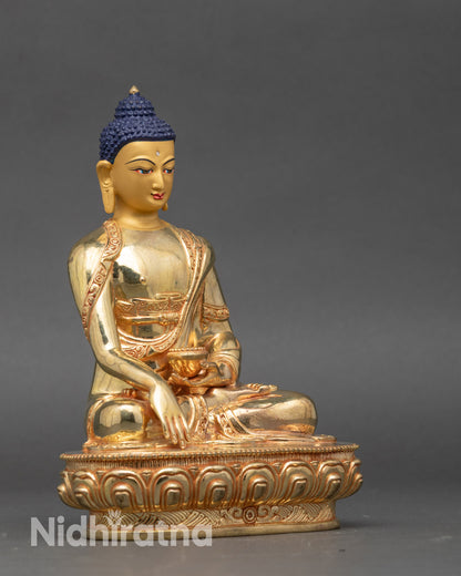 Side view Shakyamuni Buddha statue holding begging bowl Himalayan sculpture