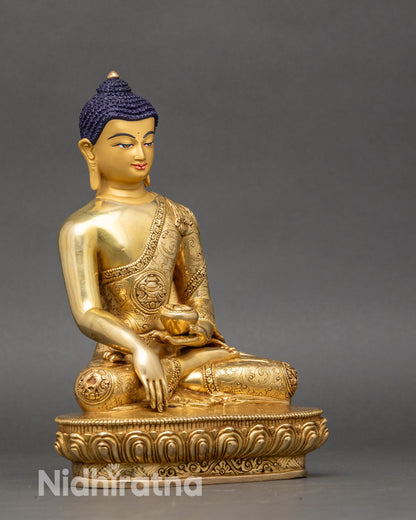 Side view Shakyamuni Buddha statue monk’s robe carved with Eight Auspicious Symbols