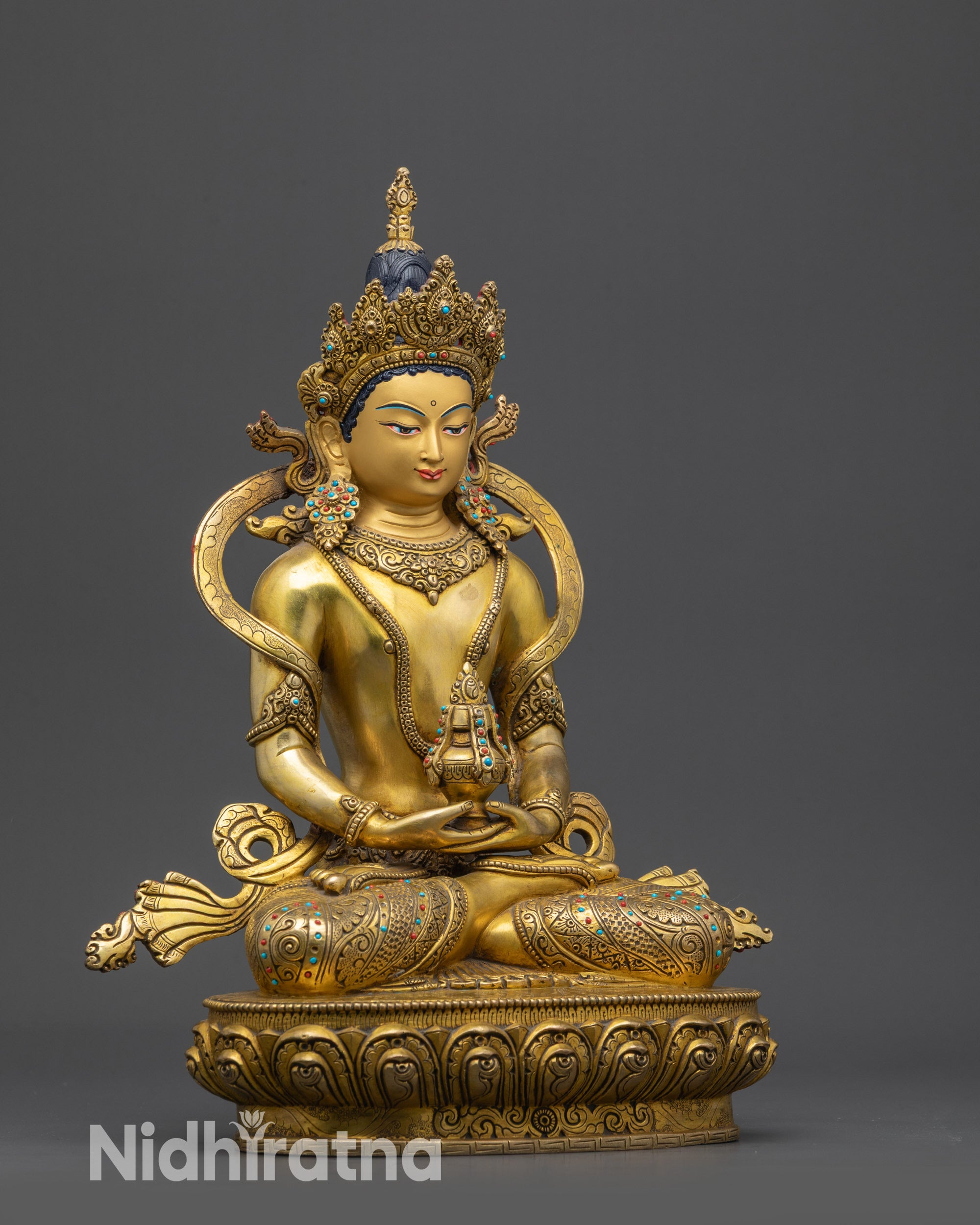 Side view Tibetan Amitayus Sculpture showing flowing robe and detailed carvings