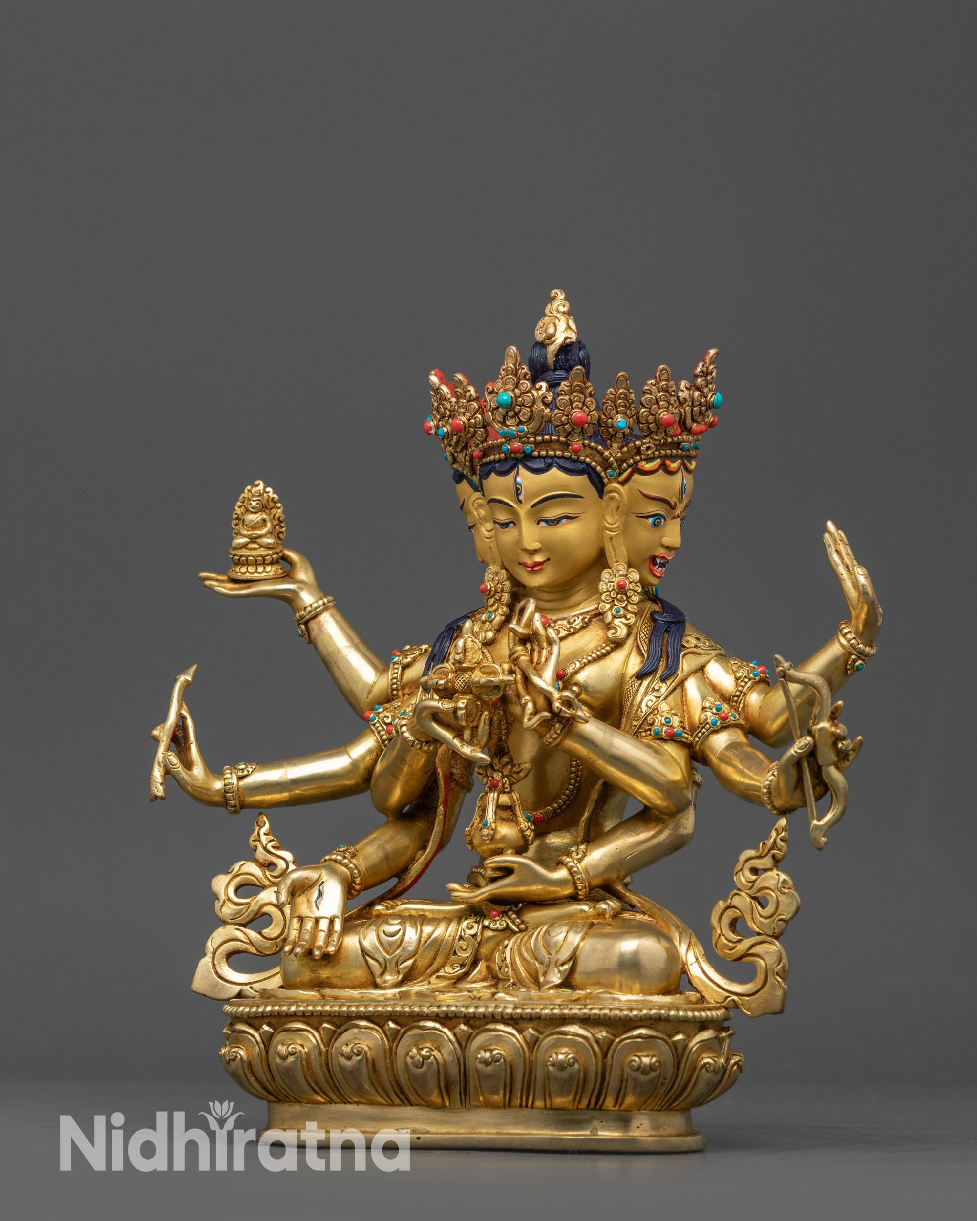 Side view Tibetan Buddhist Namgyalma statue with detailed robe and semi-precious stones