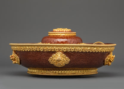 Side view Tibetan Torjang offering plate with gold-plated Ashtamangala symbols