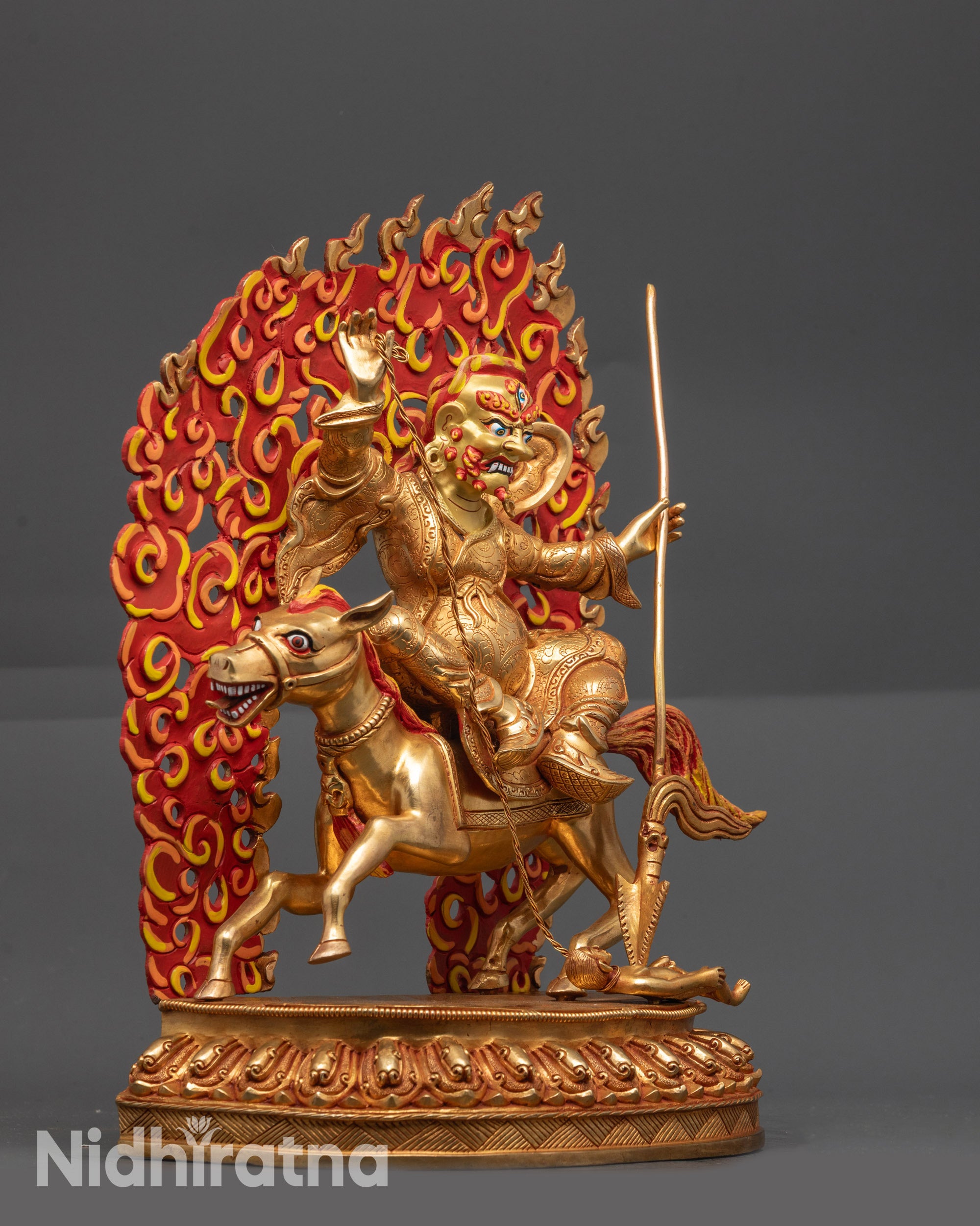 Side view Tsengo Rolpa Chudan Statue highlighting intricate warrior garments and horse stance