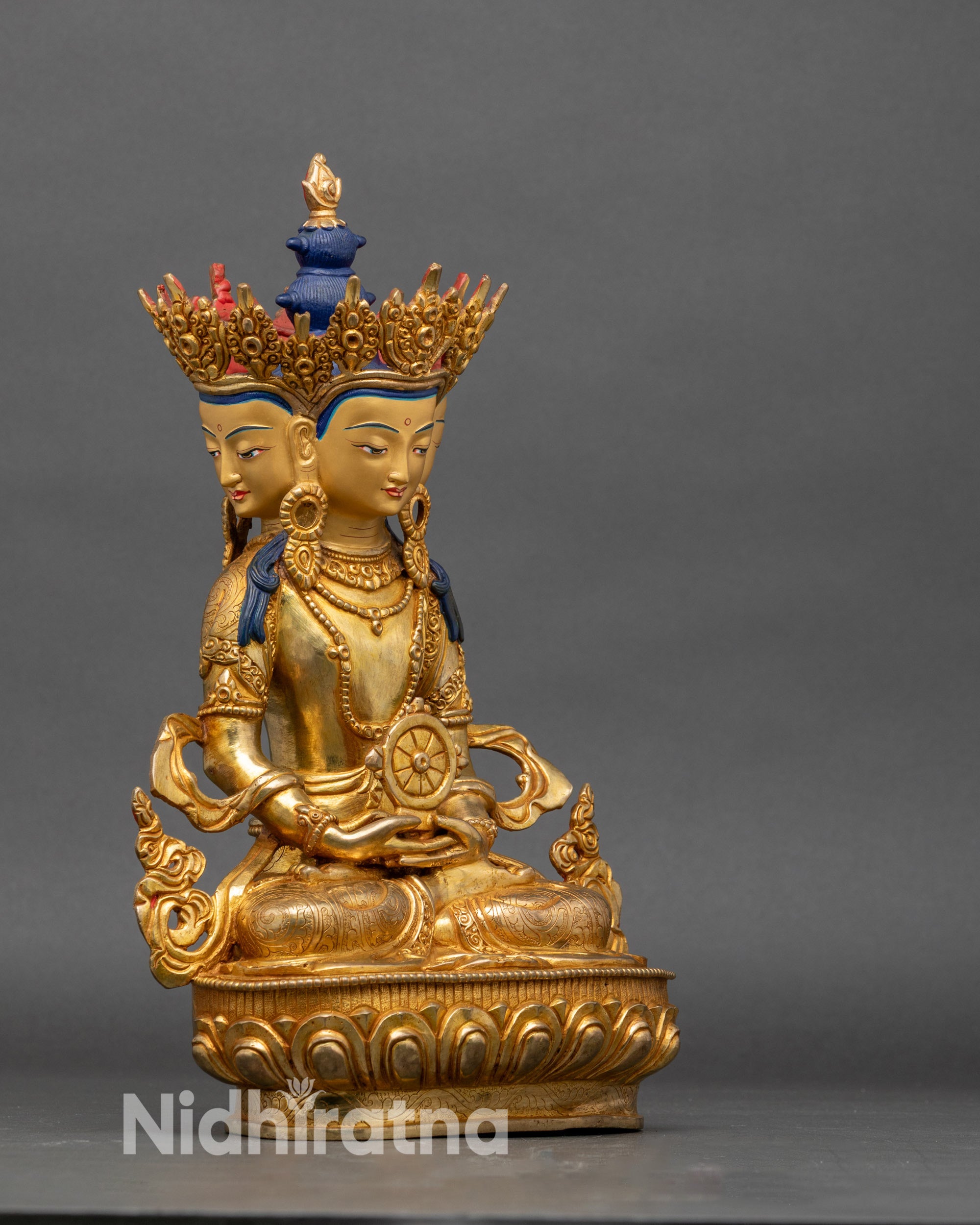 Side view Vairocana Buddha statue Dhyana Mudra holding Dharma Wheel meditation