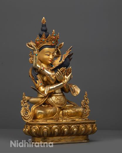 Side view Vajradhara Yab Yum statue seated on lotus with detailed jewelry patterns