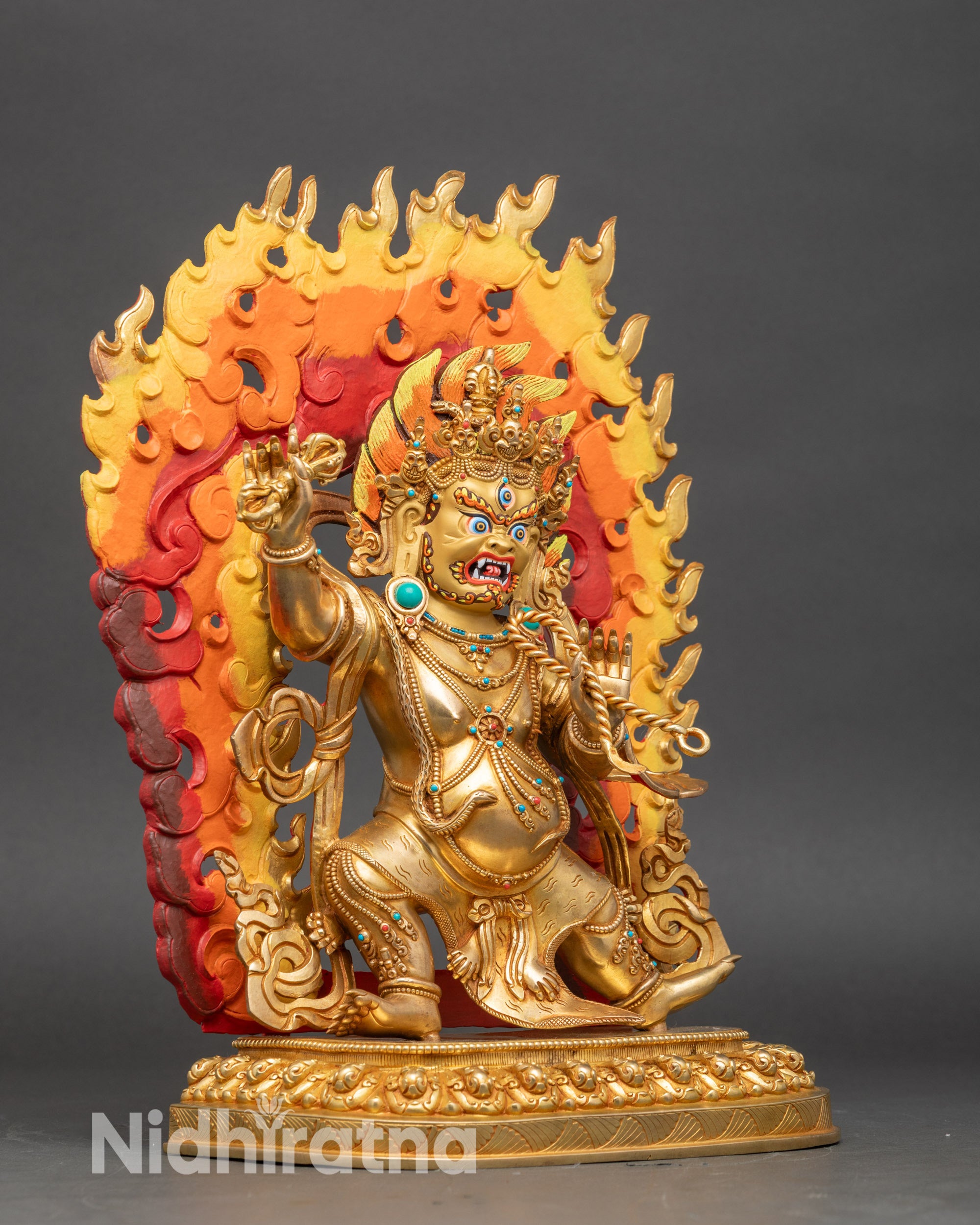 Side view Vajrapani standing on lotus seat with flaming halo and detailed robes