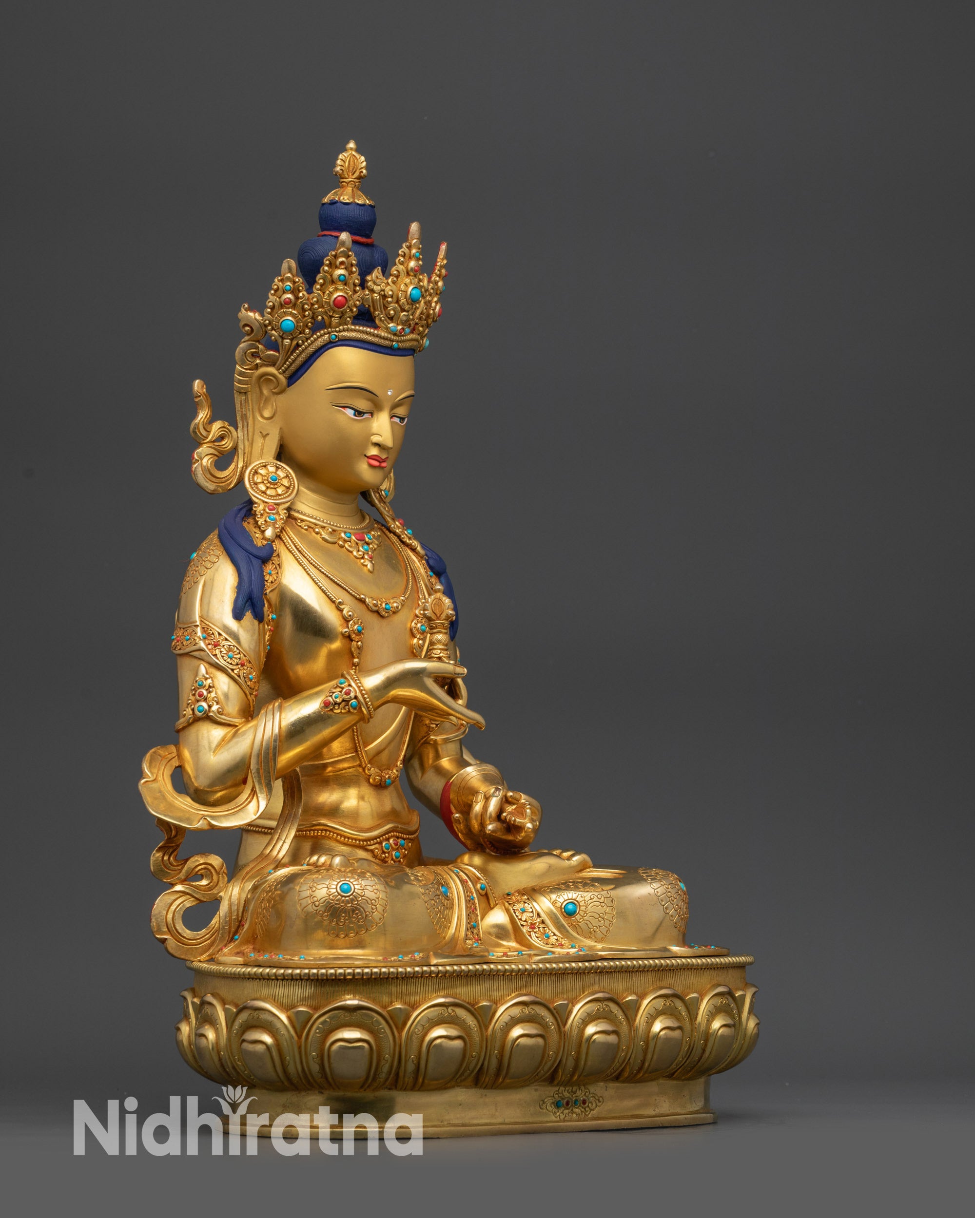 Side view Vajrasattva Buddha Himalayan deity with flowing robe and ornate lotus seat
