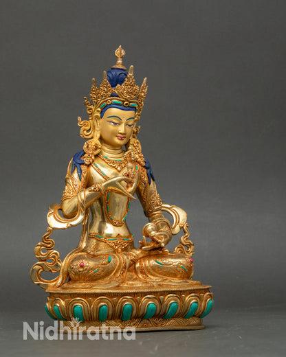 Side view Vajrasattva statue, holding vajra and bell, lotus base, Nepalese handmade art