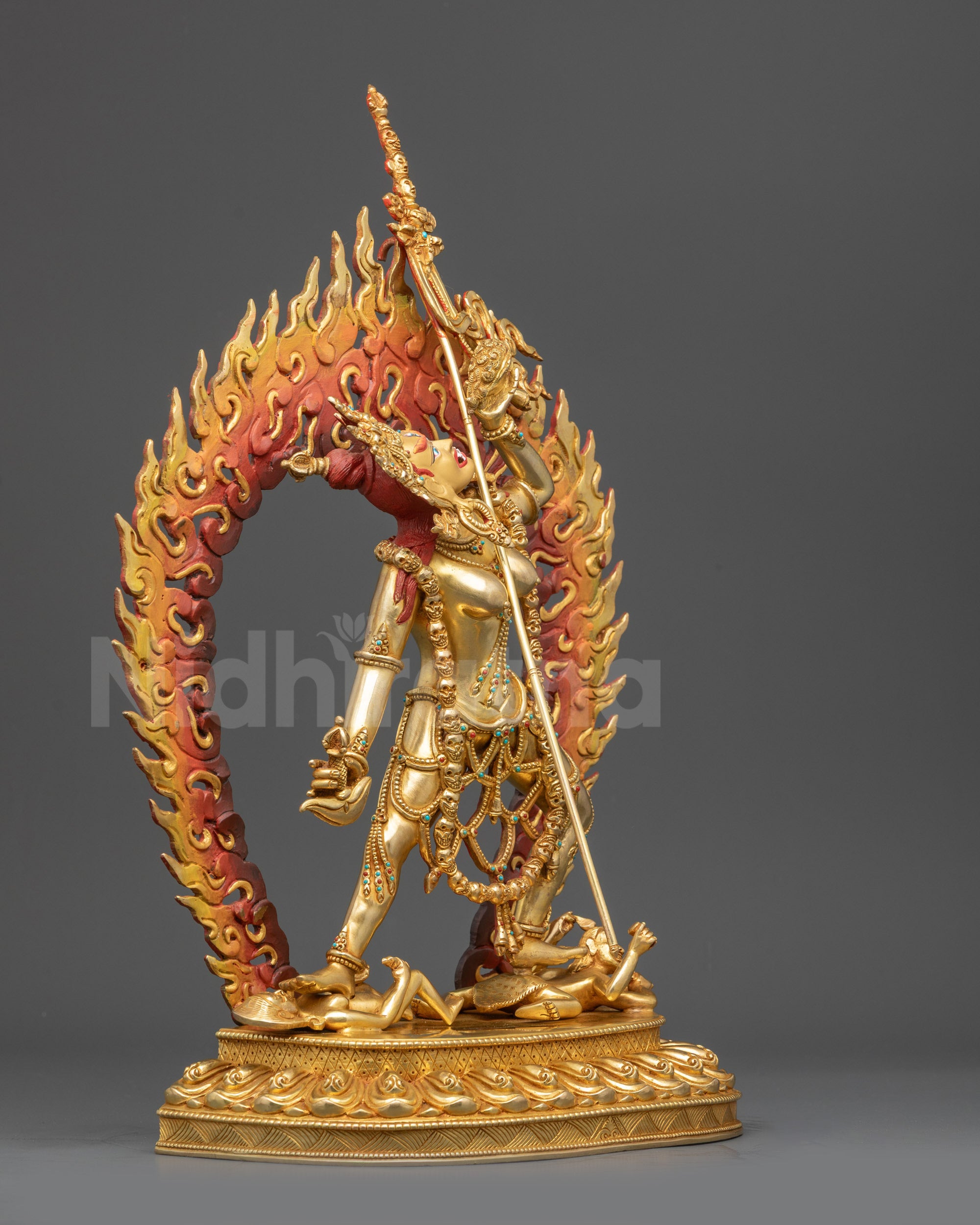 Side view Vajrayogini statue | Kartrika knife, kapala cup, trident on shoulder