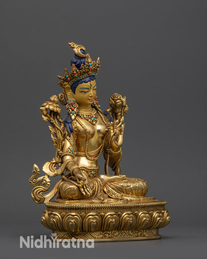 Side view White Tara holding utpala flower with Varada and Vitarka mudras