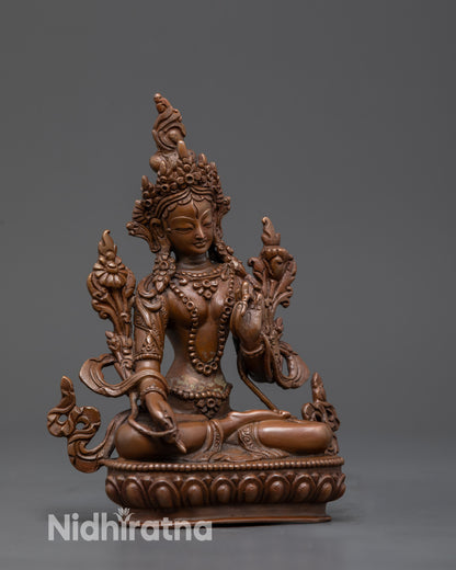 Side view White Tara oxidized copper statue with Utpala flower and seven seeing eyes