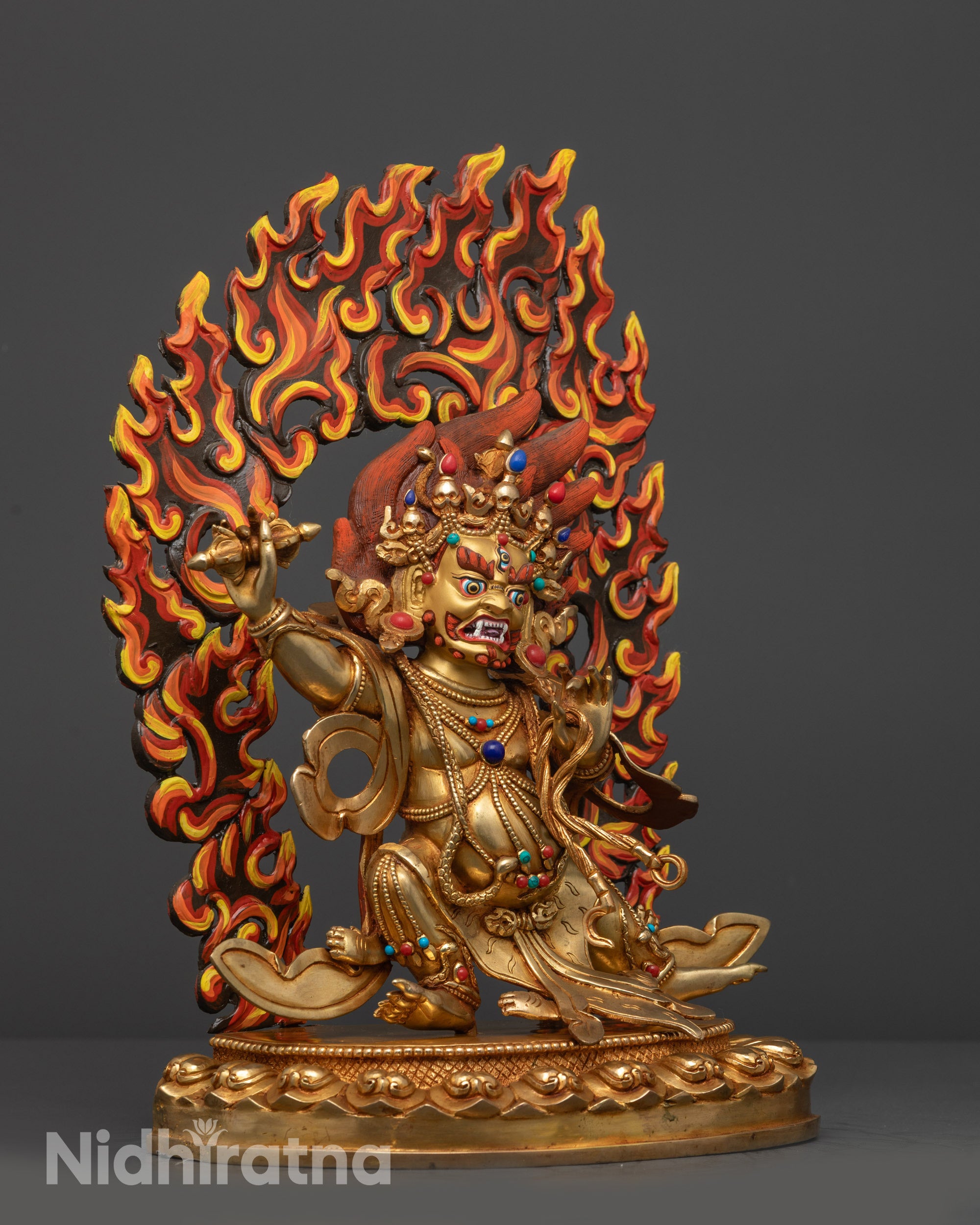 Side view Wrathful Vajrapani Statue with skull crown, jewelry, and draped tiger skin robe
