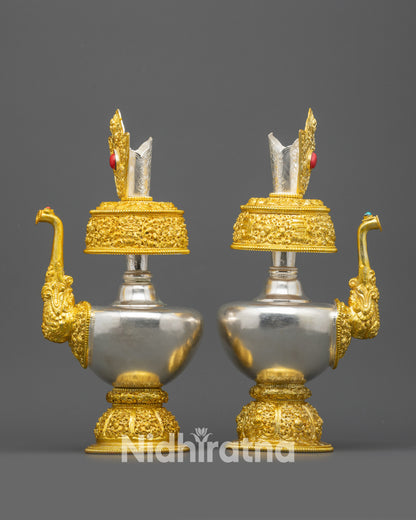 Side view curved body and gold-plated base of Bhumba vase pair