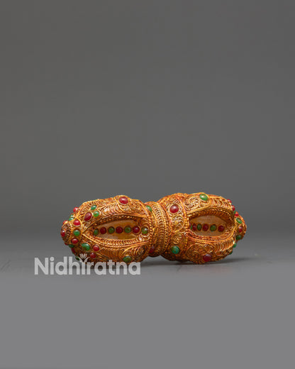 Side view double-ended Copper Vajra with ornate filigree and crystal center