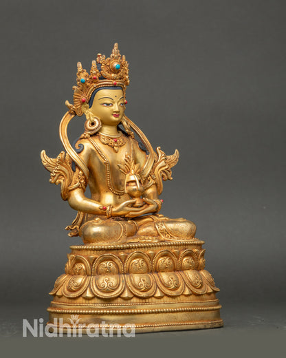 Side view handcrafted Amitayus statue seated on lotus throne holding medicinal vase