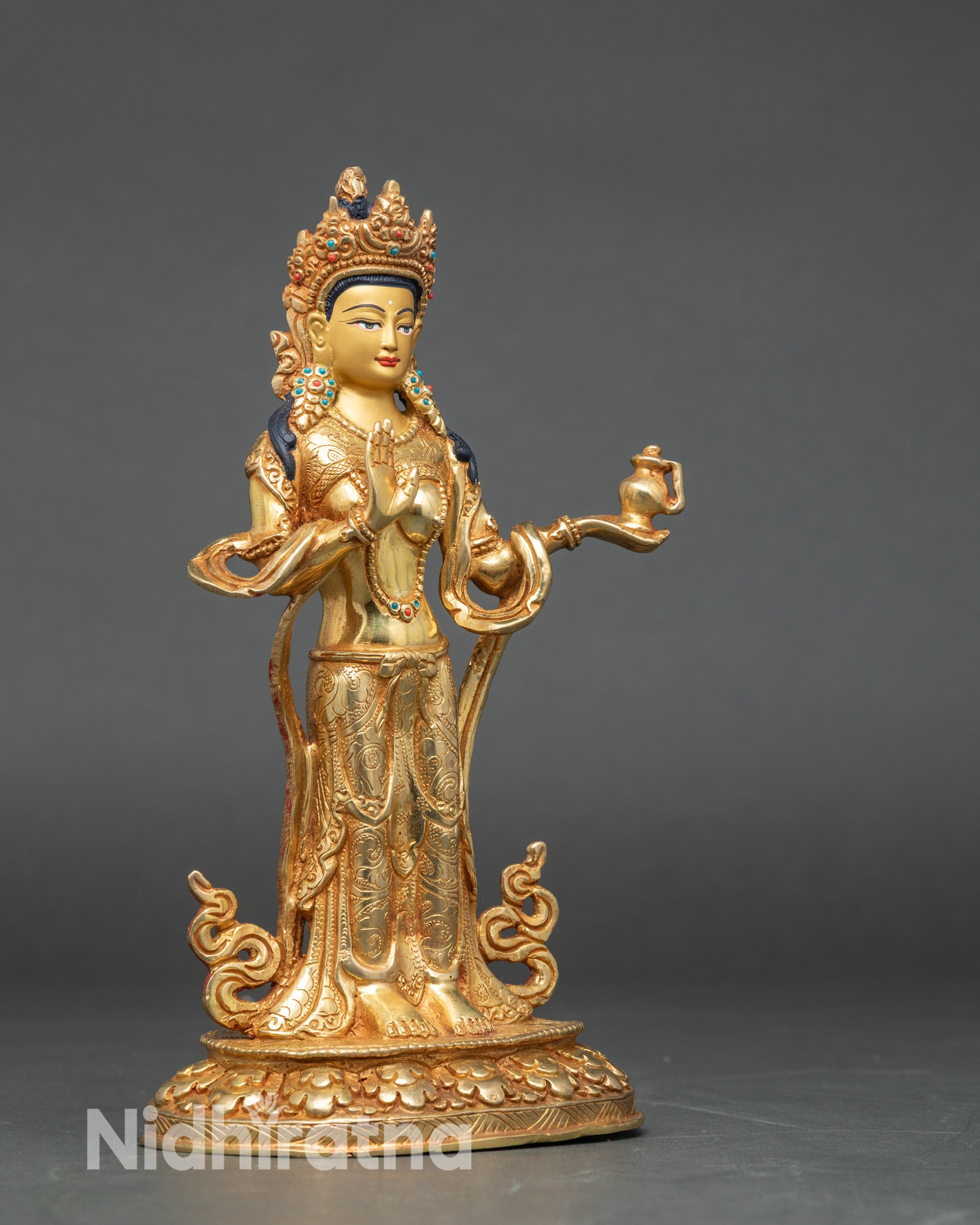 Side view lotus seat skull cup and vase Nepalese tantric deity statues