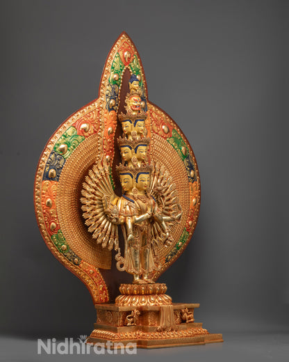 Side view of 1000-Armed Chenrezig Sculpture showing carved patterns and halo details
