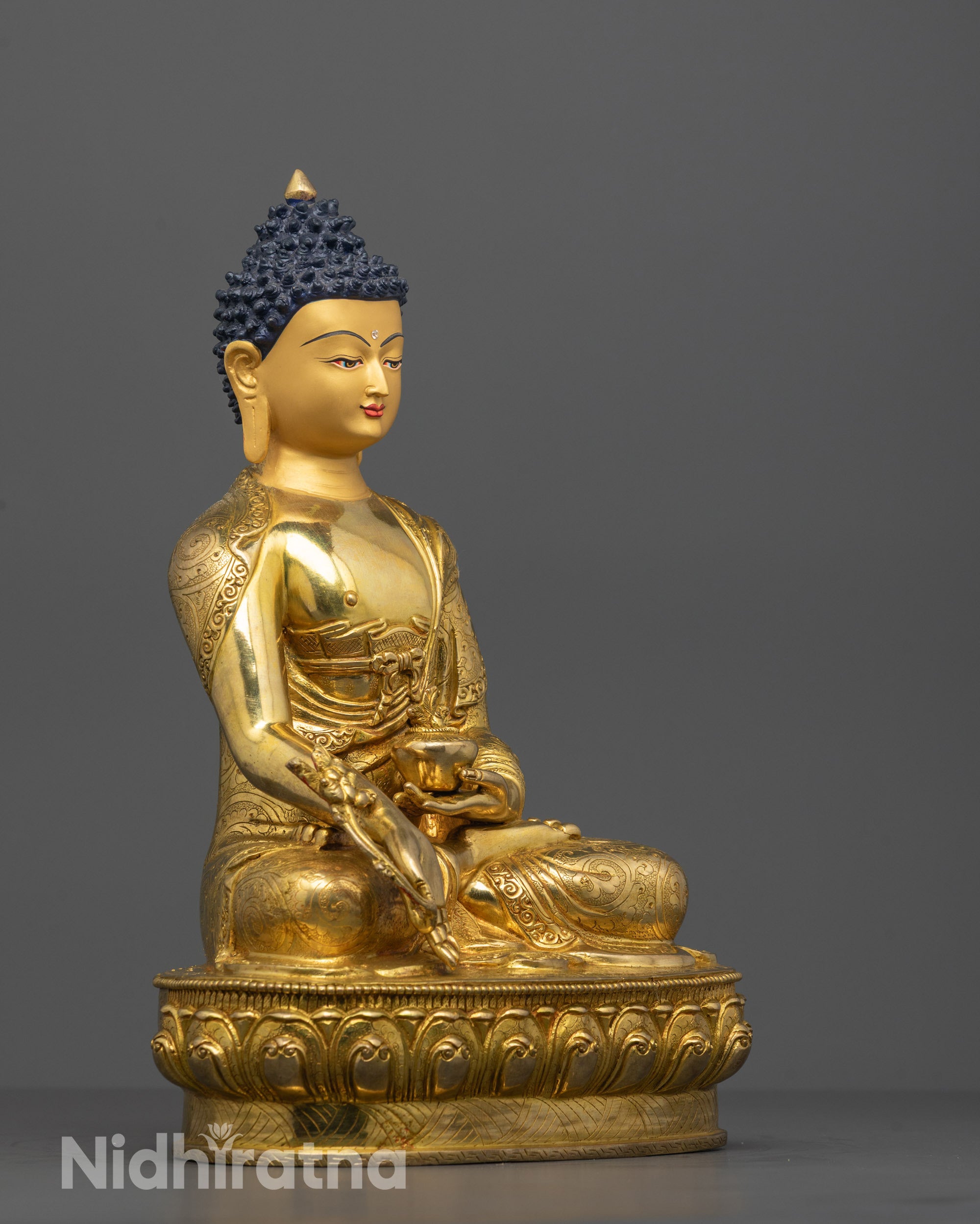 Side view of 24k gold fire gilded Medicine Buddha Statue showing intricate copper craftsmanship