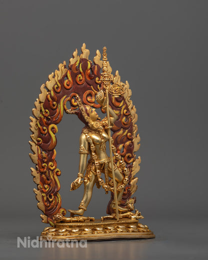 Side view of 24k gold gilded Vajrayogini Sculpture with ornate halo