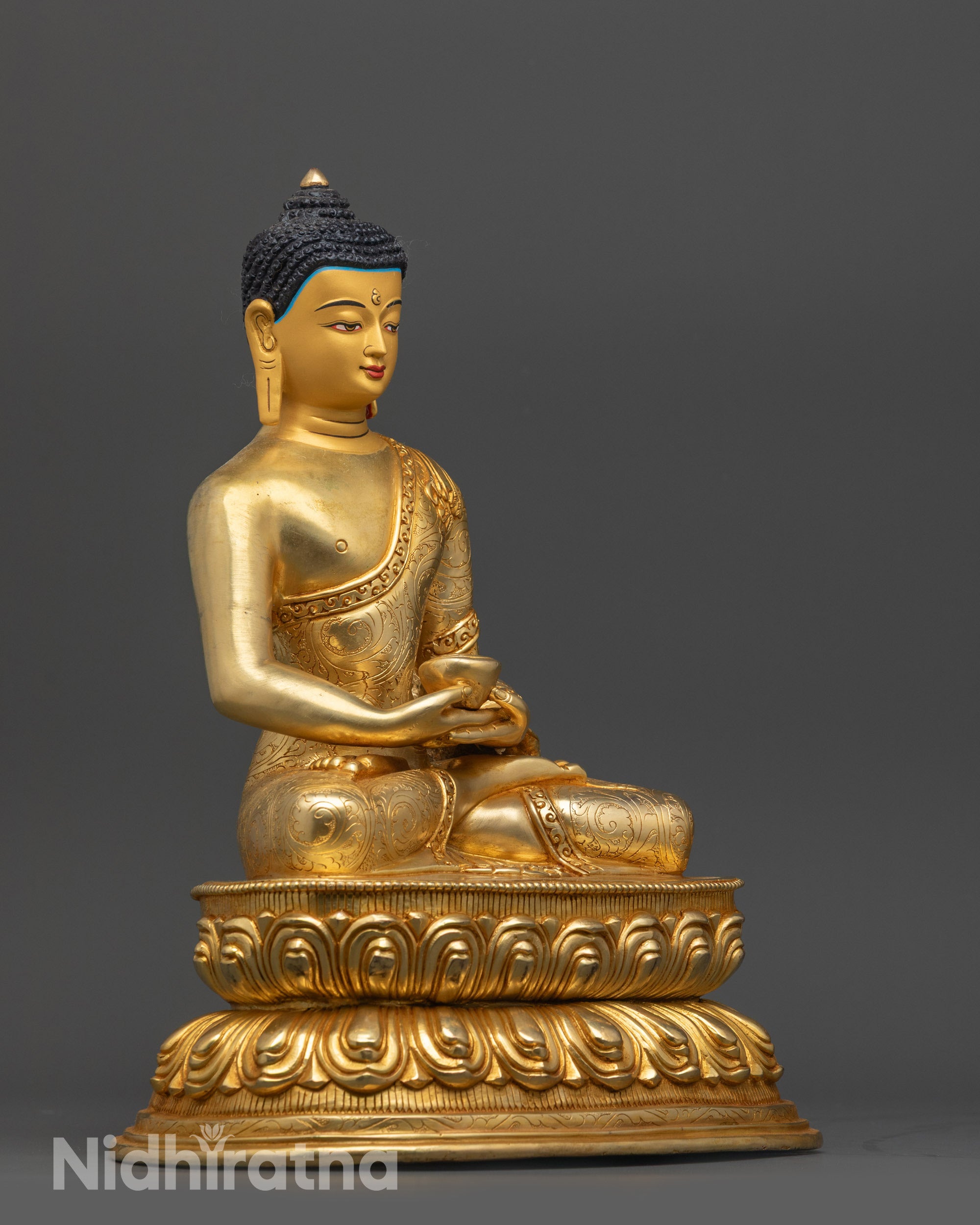 Side view of Amitabha Buddha Statue seated on double layered lotus throne
