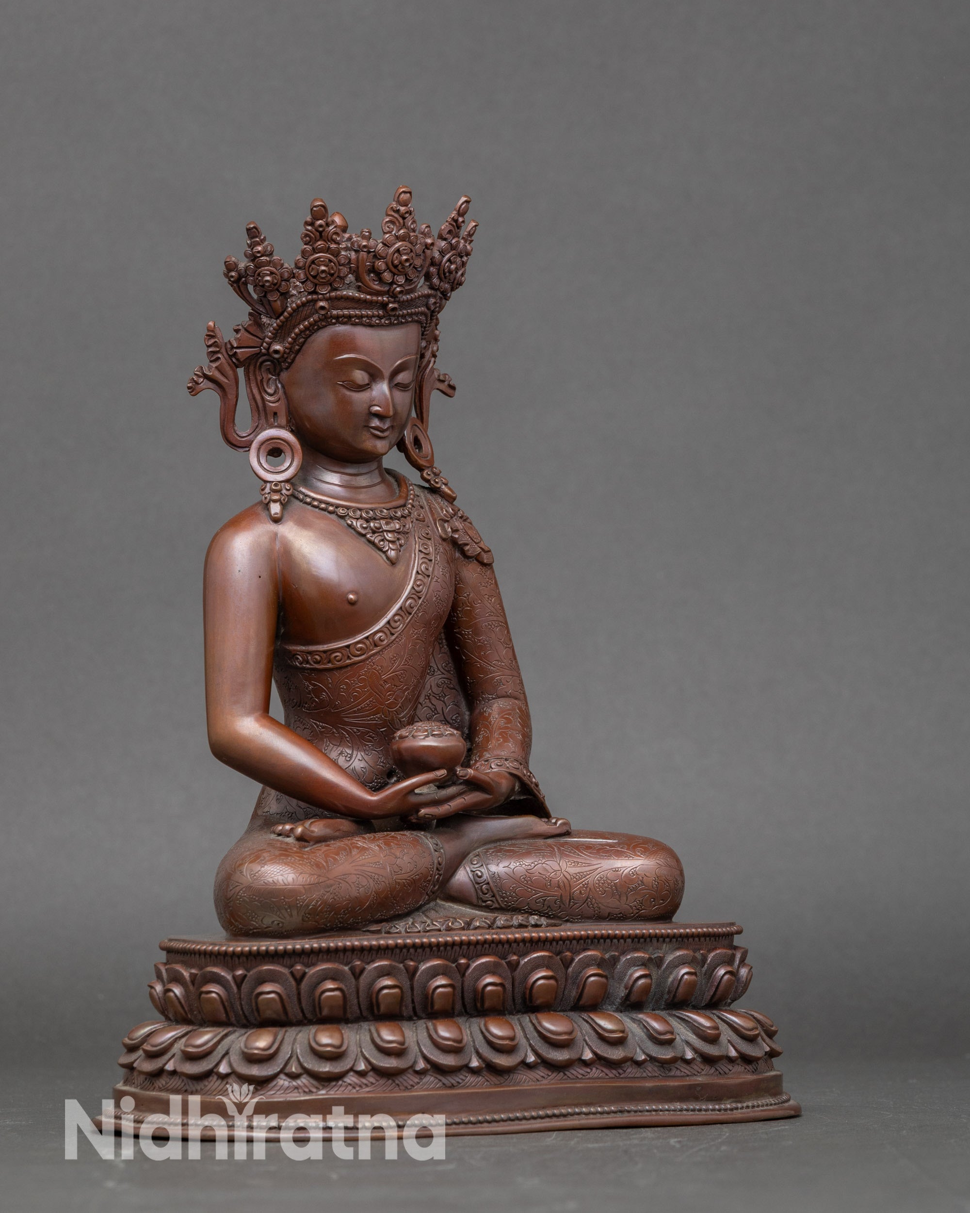 Side view of Amitabha Buddha holding monk’s bowl, seated on lotus, Nepalese craftsmanship