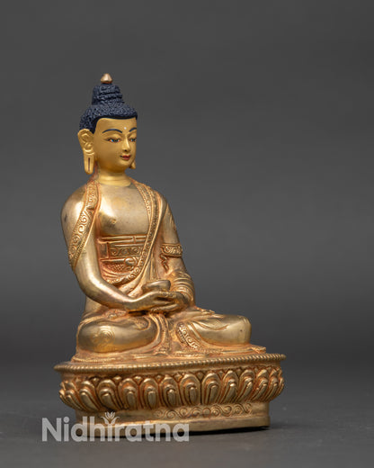 Side view of Amitabha Buddha meditation statue, copper alloy with gold accents on lotus seat