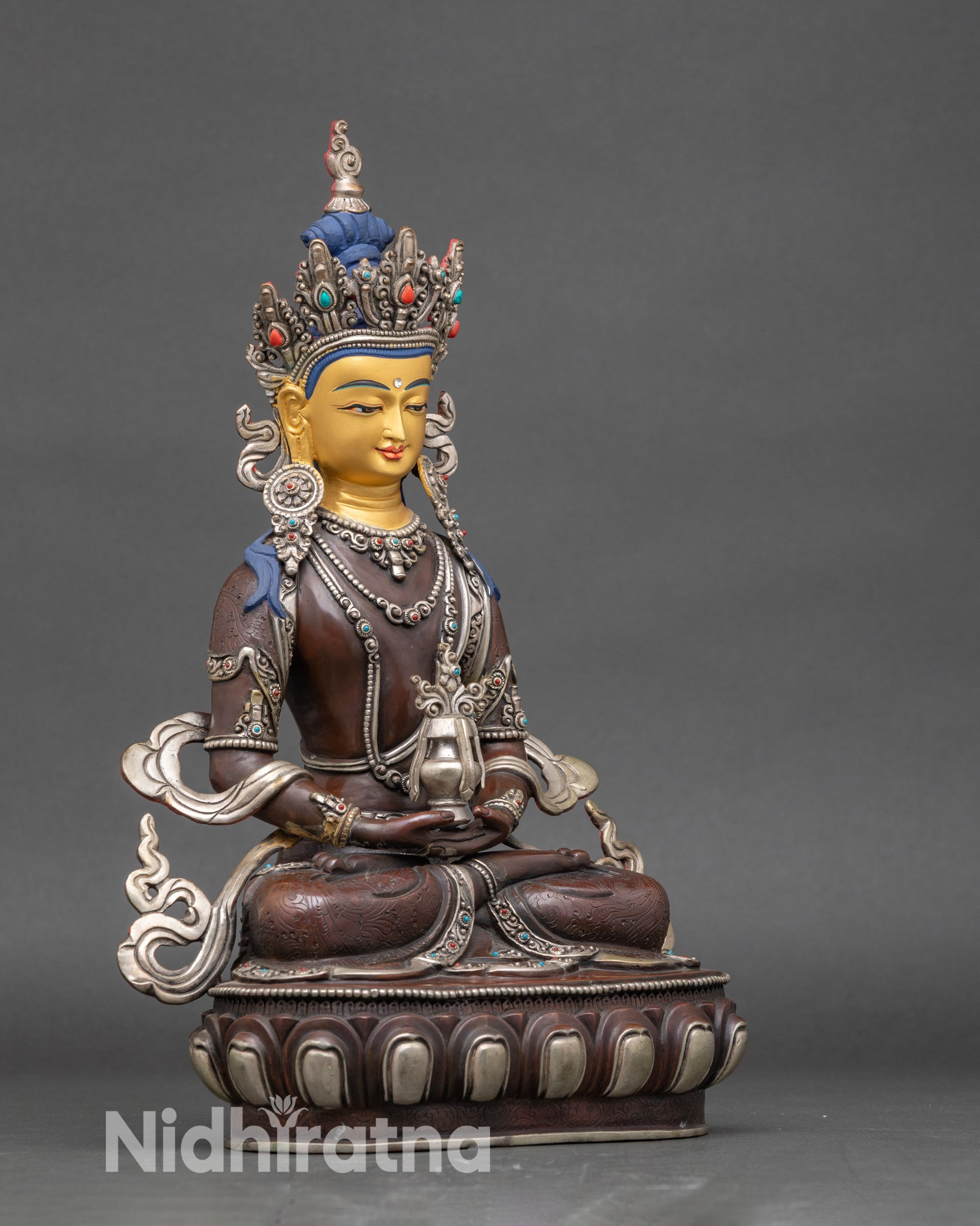 Side view of Amitayus Meditation Statue on lotus base, highlighting gold-painted face and sacred craftsmanship