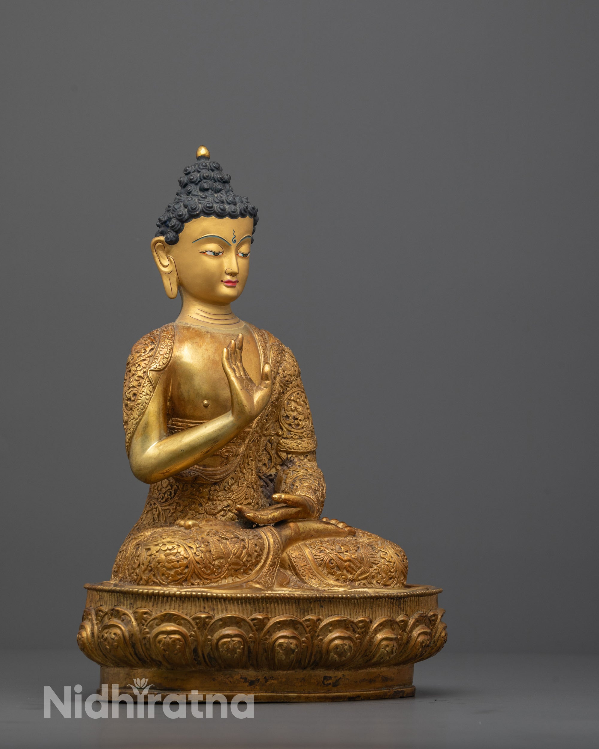 Side view of Amoghasiddhi Buddha Seated on Double Lotus Base