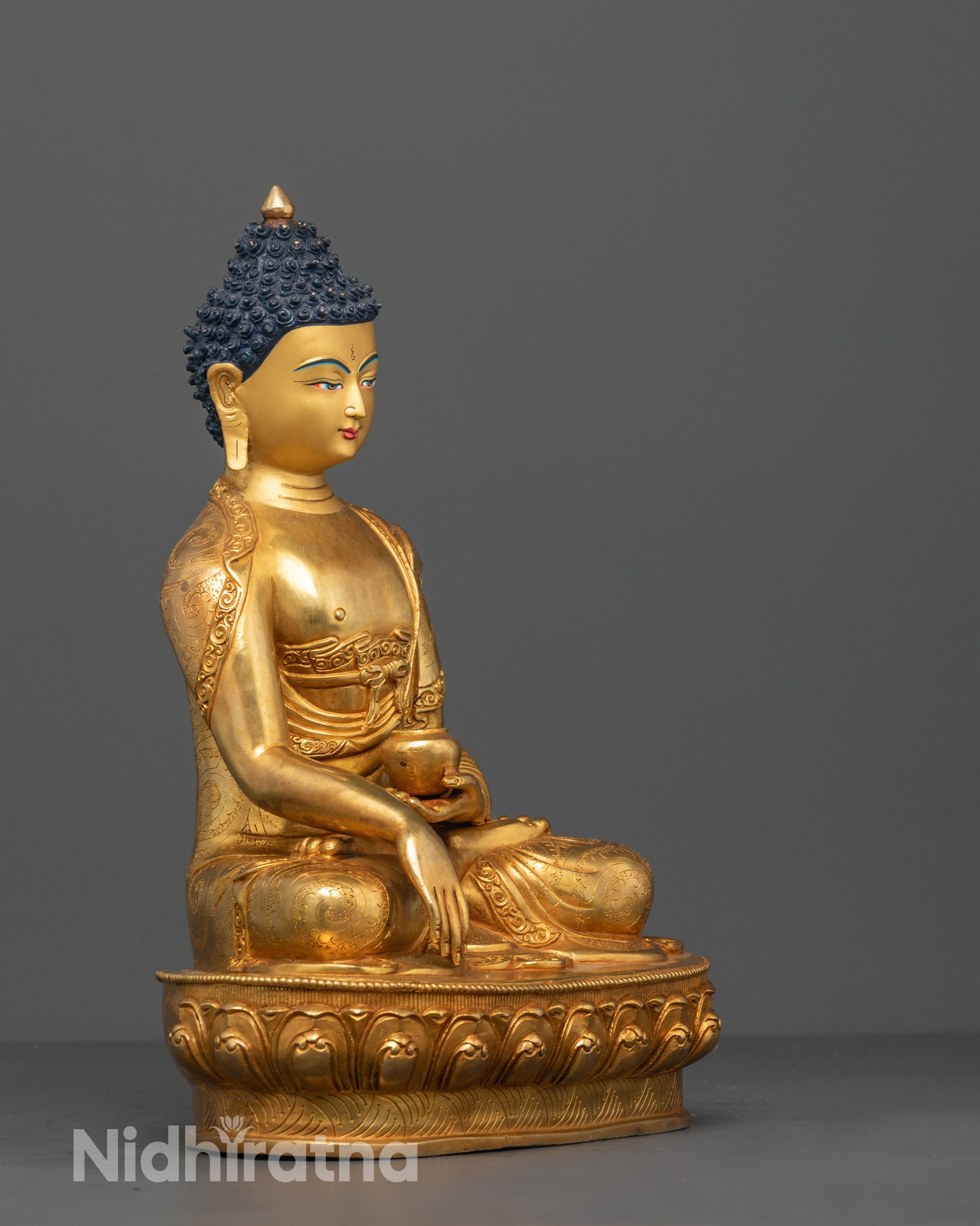 Side view of Artisan hand-carving process of Shakyamuni Buddha statue in Nepal