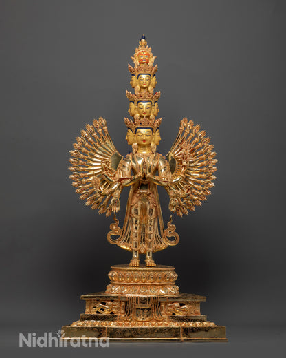 Side view of Avalokiteshvara statue highlighting 11 faces and ornate halo motifs