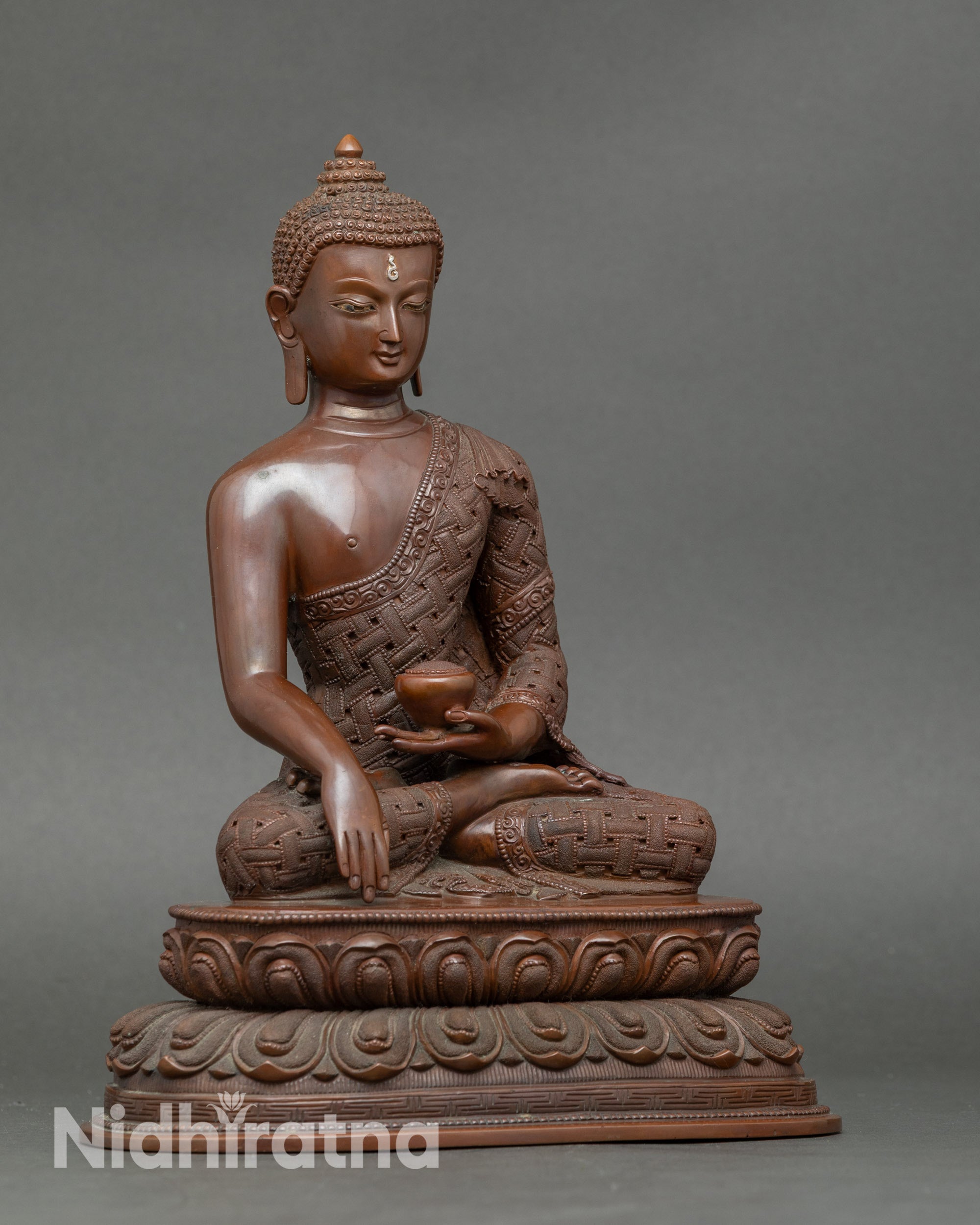 Side view of Buddha Shakyamuni statue, handcrafted Nepalese meditation sculpture