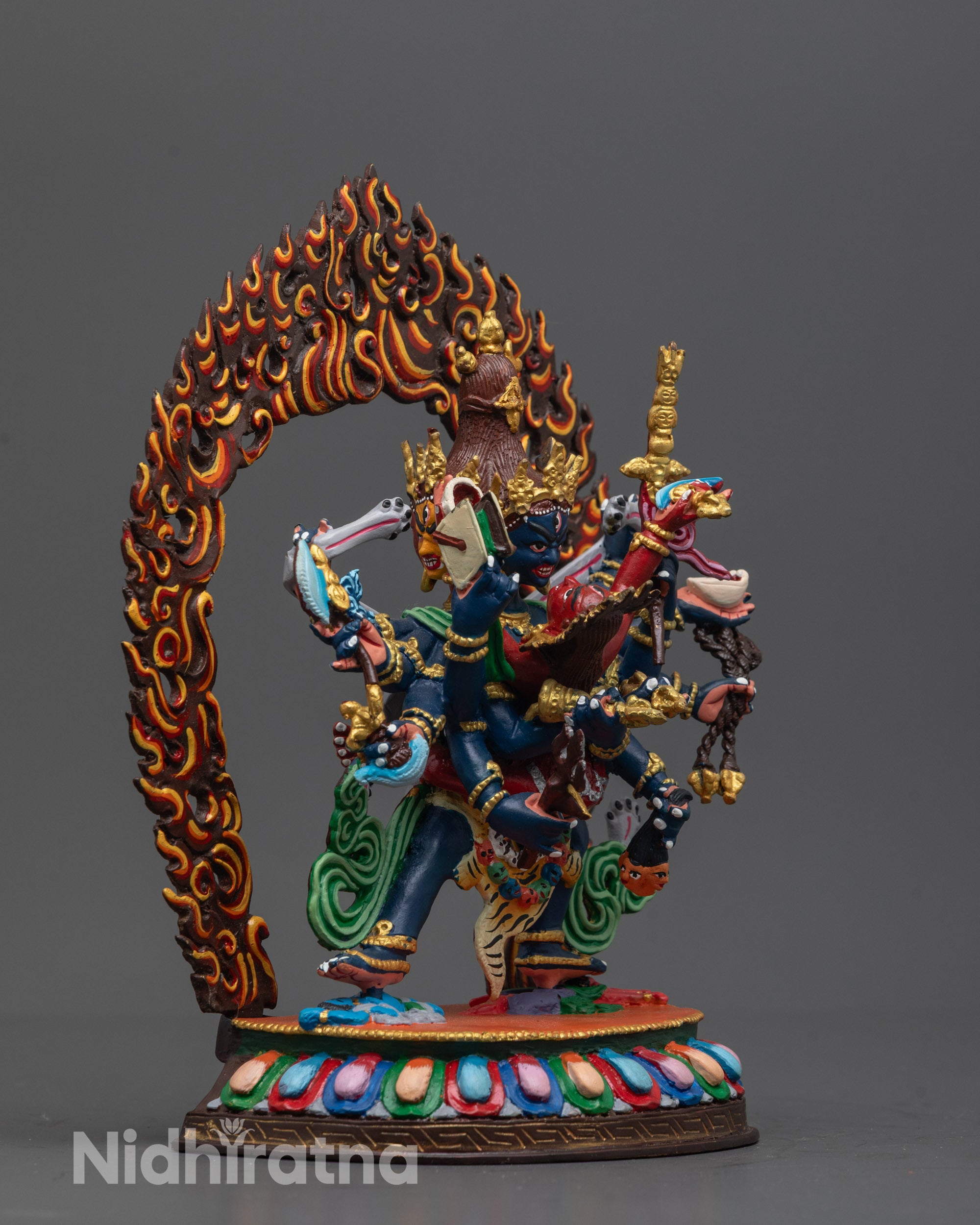 Side view of Chakrasamvara Statue with blue acrylic body, lotus seat