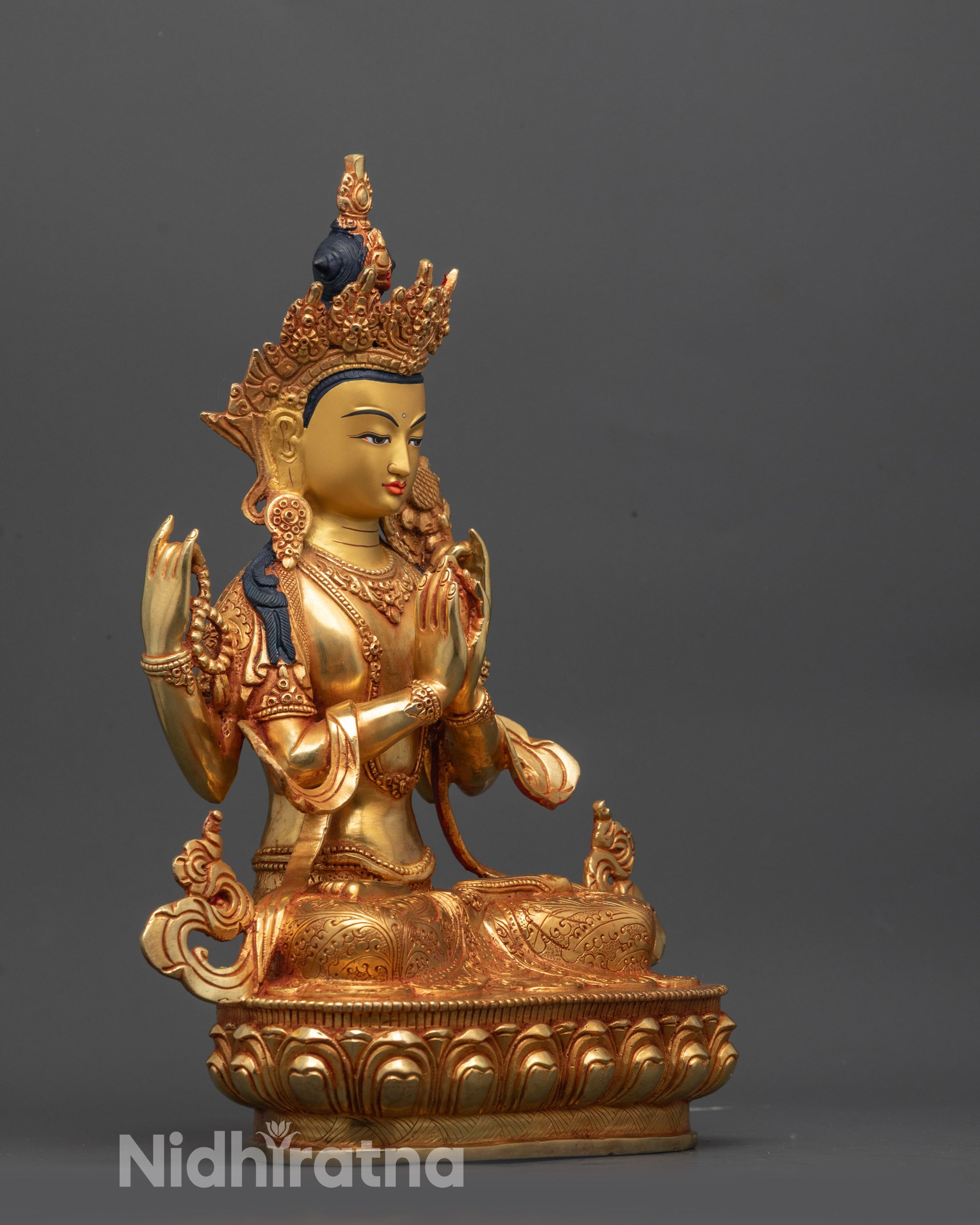 Side view of Chenrezig sculpture highlighting traditional lost-wax craftsmanship and grace
